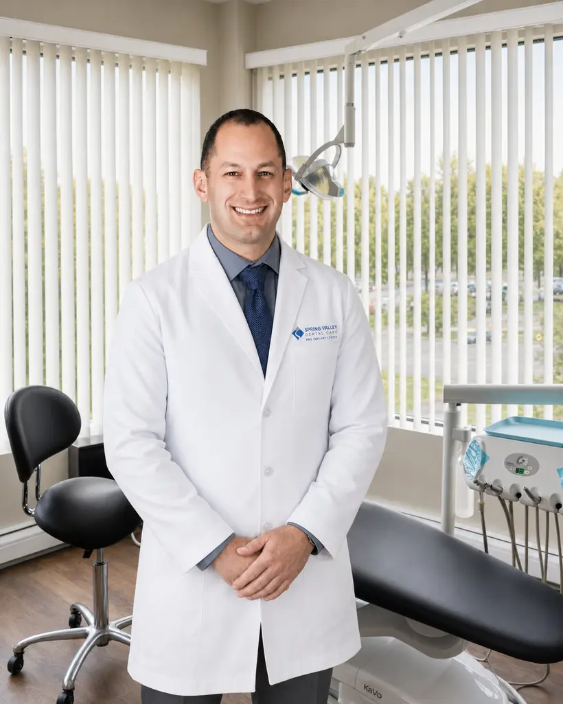 Dr. John Mady standing in the Spring Valley Dental Care operatory in Maywood, NJ